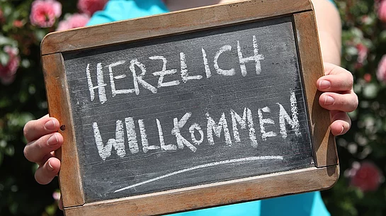Symbolbild Herzlich willkommen